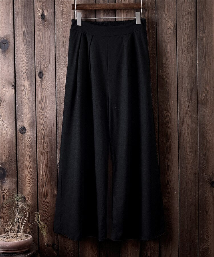 Pantaloni larghi a vita alta in lino da donna. Eleganti e versatili, questi pantaloni in lino a vita alta offrono una vestibilità comoda e sofisticata.