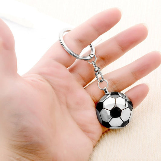 Portachiavi in metallo con design a tema calcio.
