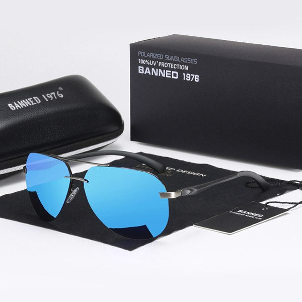 Occhiali da sole da uomo in alluminio e magnesio. Questi occhiali da sole combinano materiali di alta qualità per garantire leggerezza, resistenza e un look sofisticato.